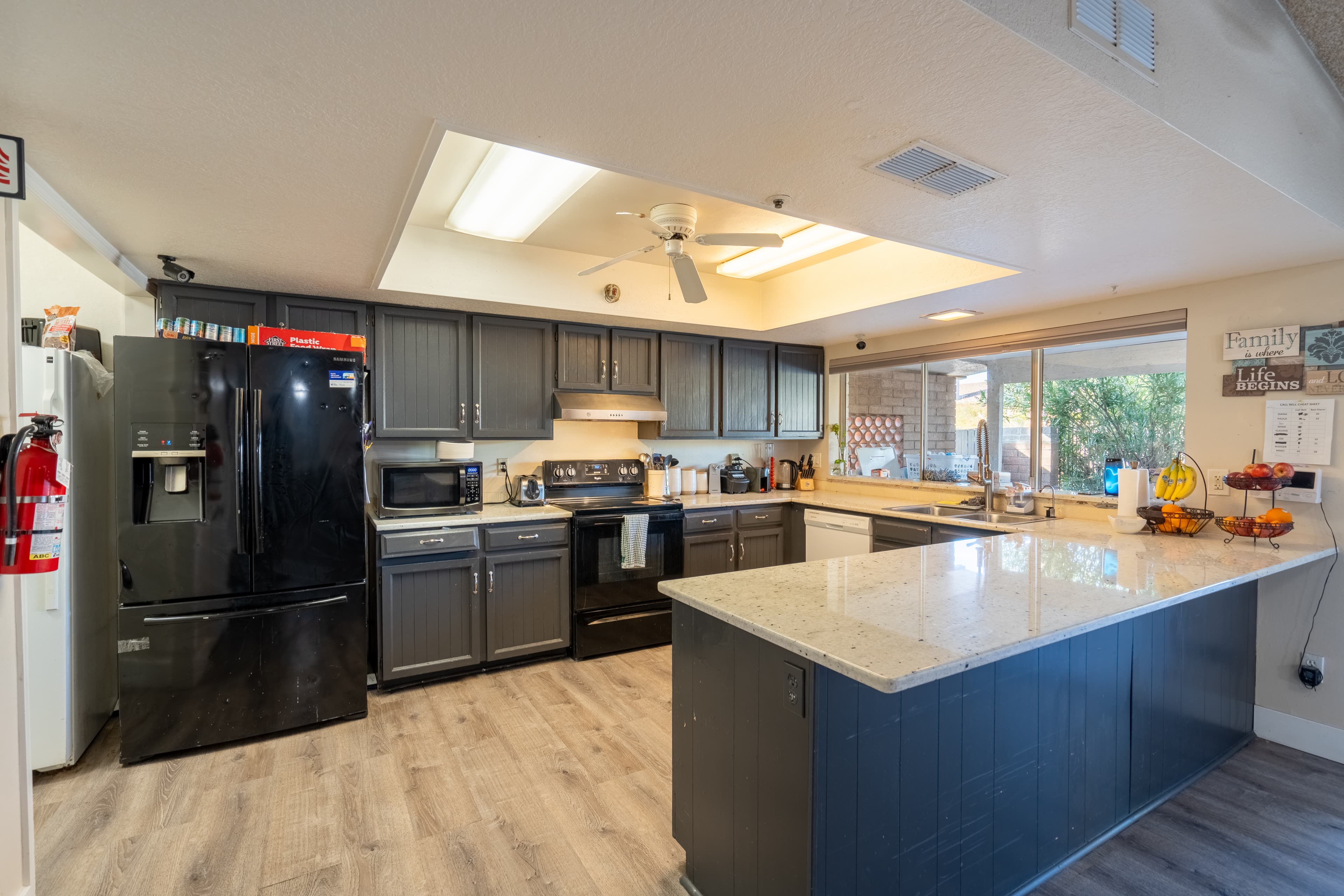 Living and dining area with recliner seating